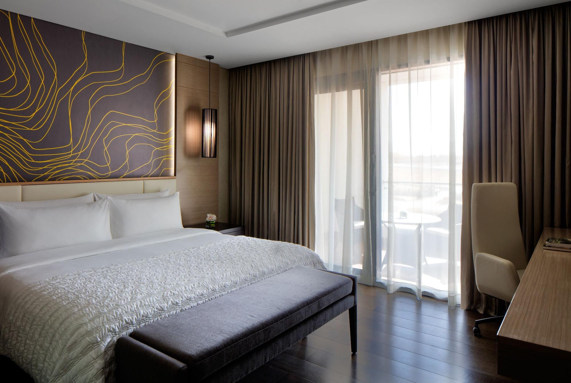 Radisson Collection Muscat, Hormuz Grand Ξενοδοχείο Εξωτερικό φωτογραφία A bedroom at the hotel